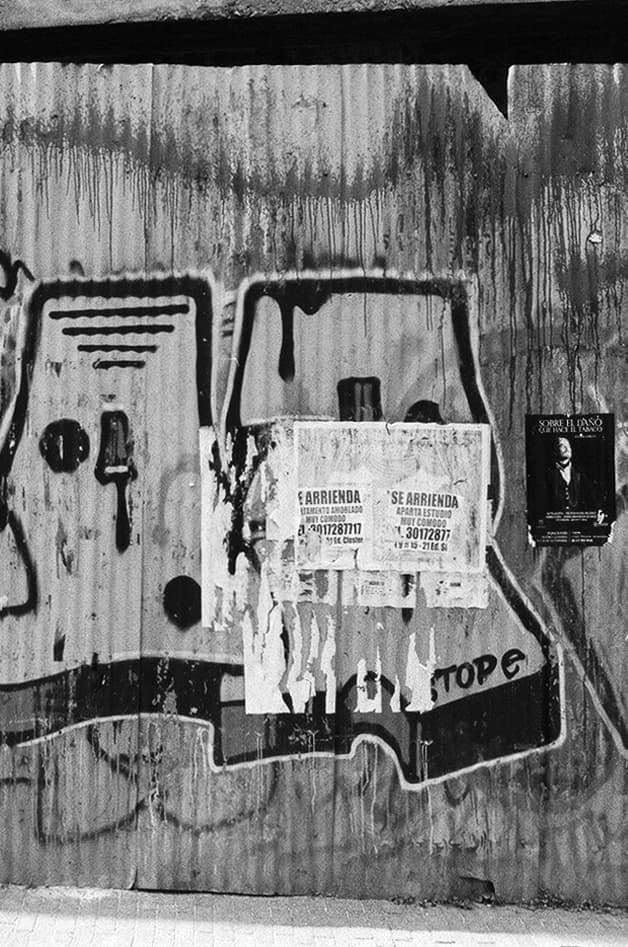 Advertisement over graffiti