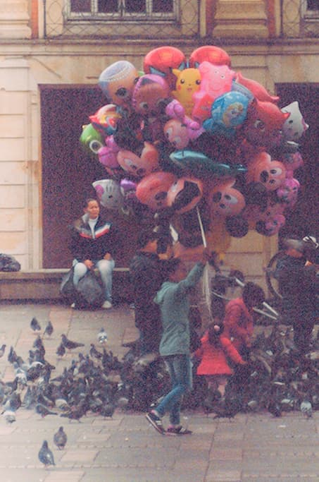 Lady selling balloons