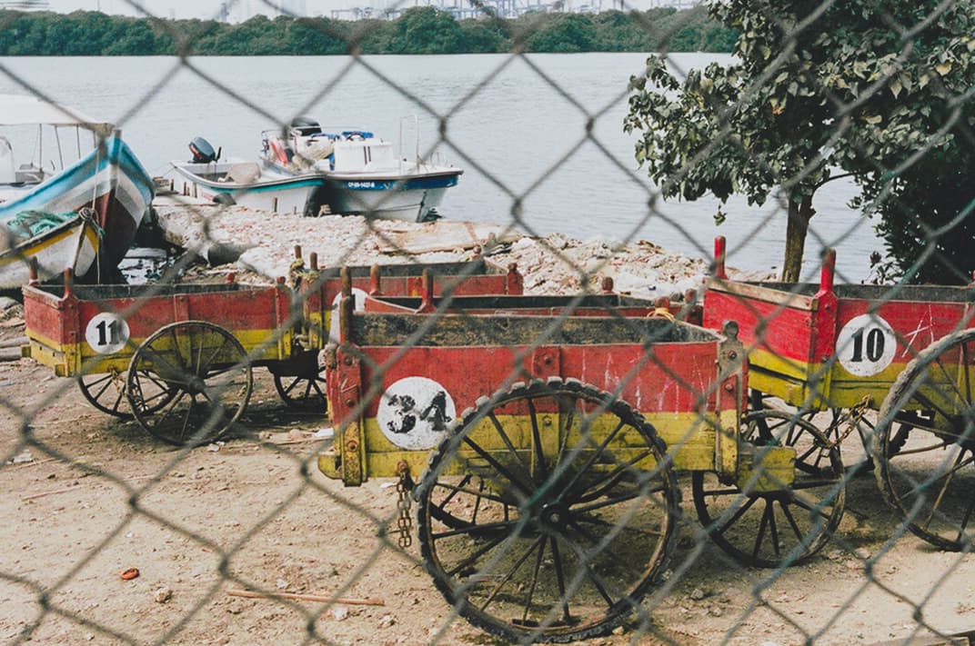 Carts behind a fence